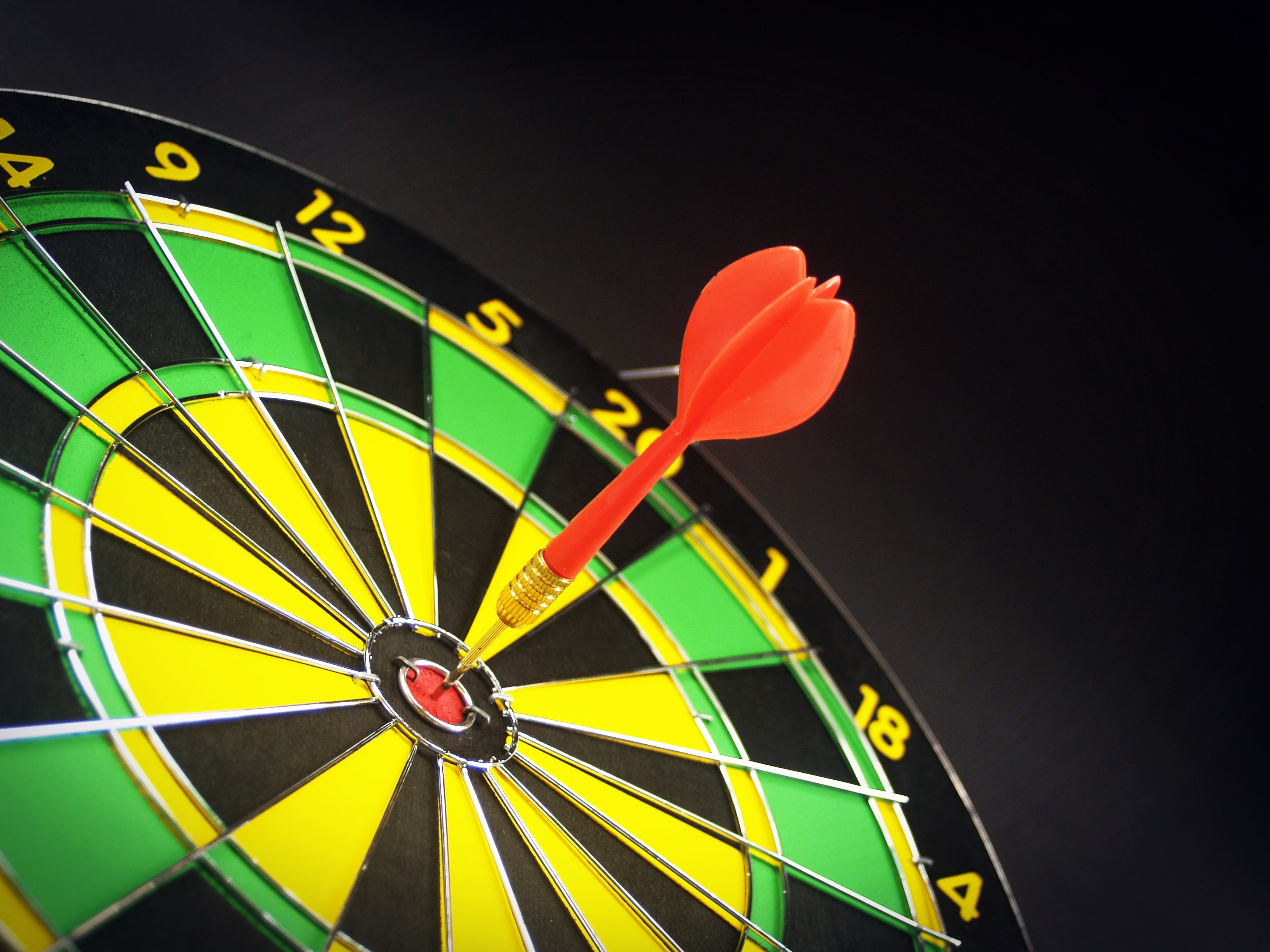 dartboard target aim goal achievement concept