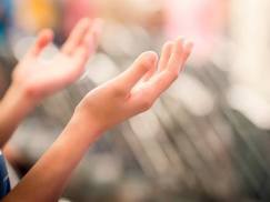Faith-Christian-hands-pray-praise-worship_credit-Shutterstock
