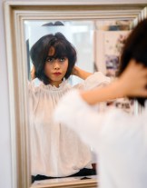 selective-focus-photography-of-woman-in-front-of-mirror-1476291
